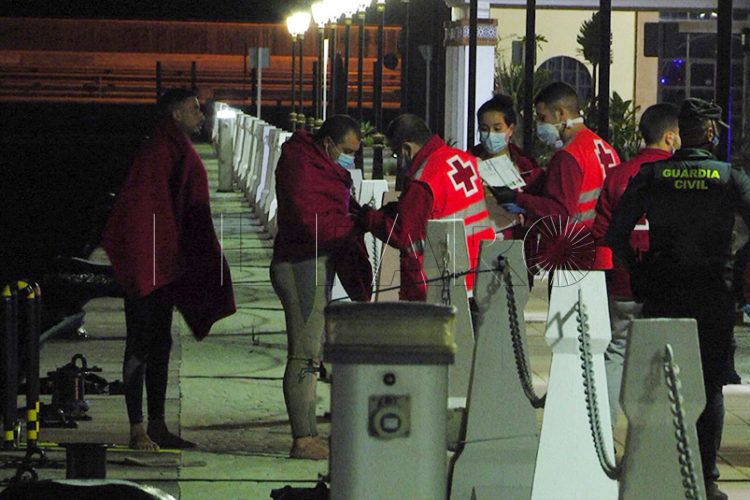 inmigrantes-muelle-españa