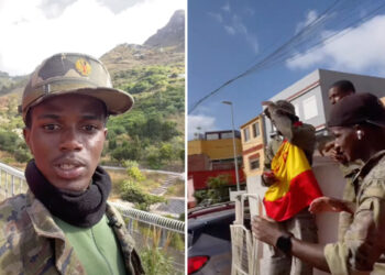 subsaharianos-bailan-frente-valla-ceuta-ropa-ejercito-bandera-espana-1