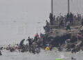 peor-crisis-migratoria-sufre-ceuta-inaccion-marruecos-fotos-frontera-inmigrantes-nado-guardia-civil-300