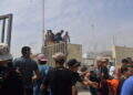 peor-crisis-migratoria-sufre-ceuta-inaccion-marruecos-fotos-frontera-inmigrantes-nado-guardia-civil-320